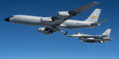 U.S. Air Force KC-135 Stratotanker aerial refueling an F-16 Fighting Falcon fighter jet in flight
