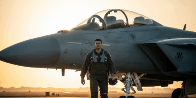 a us air force fighter pilot in flight suit walking toward a 20260529 121406